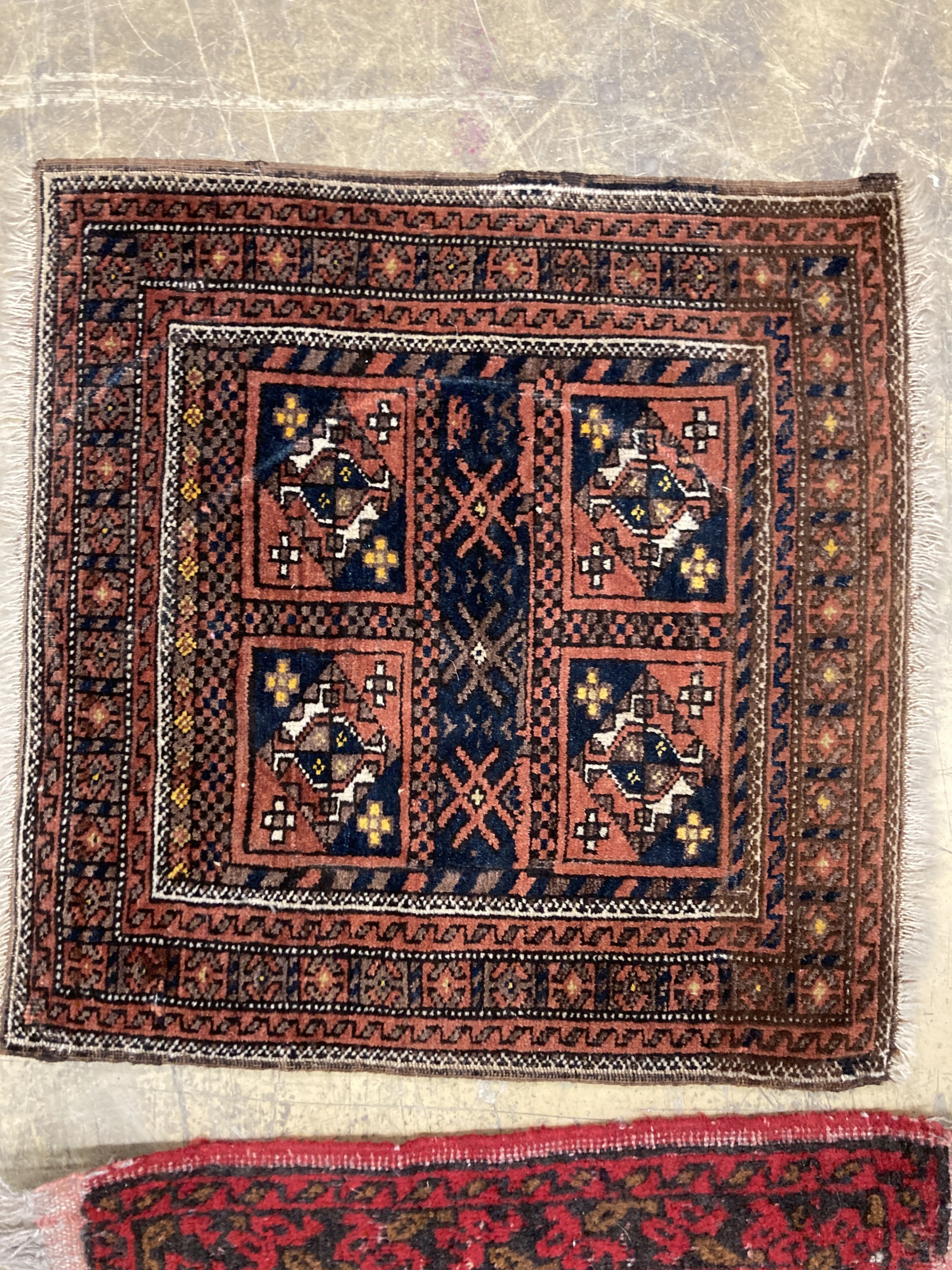 An antique Bokhara rug 170 x 94, Turkoman mat, a Belouch mat and two others.